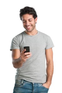 Hispanic_Millennial_Male_Using_Smartphone