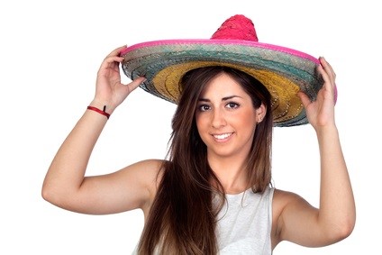 Attractive girl with a Mexican hat